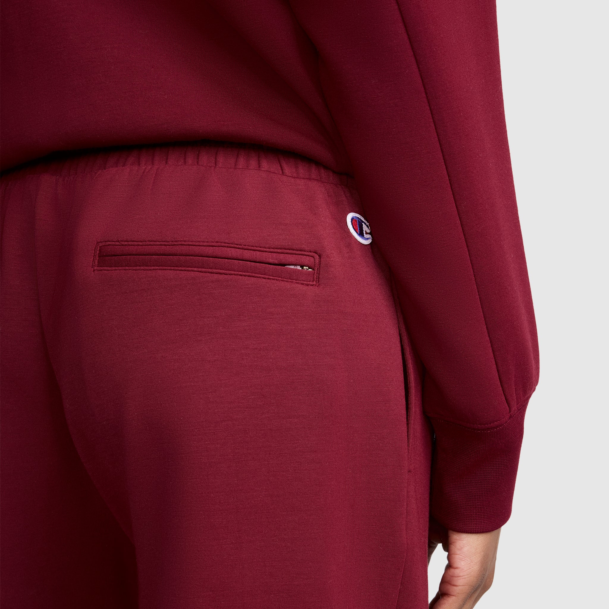 Champion Jogger femme fuselé rouge Cabernet zips