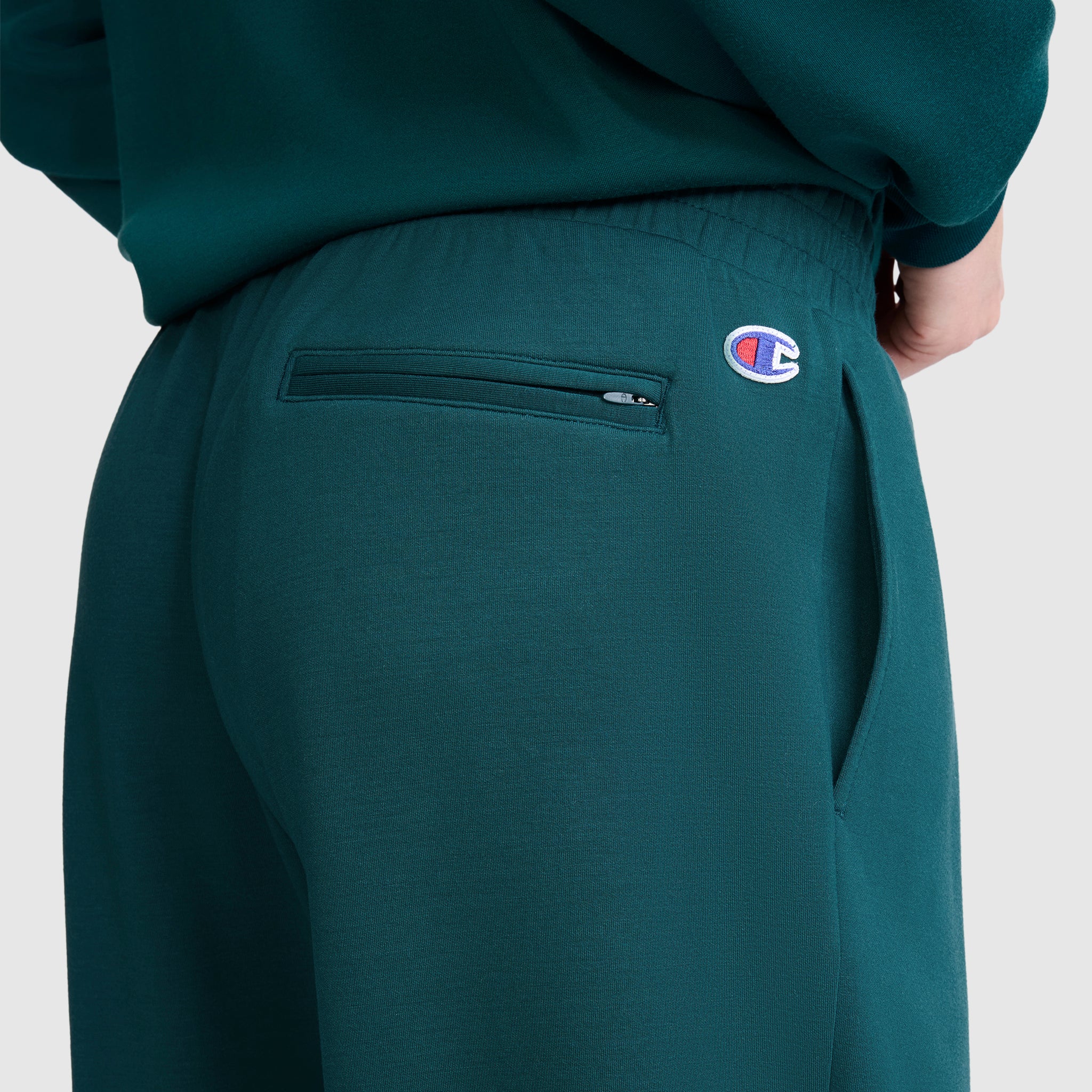 Champion Taper Leg jogger femme vert sarcelle zip