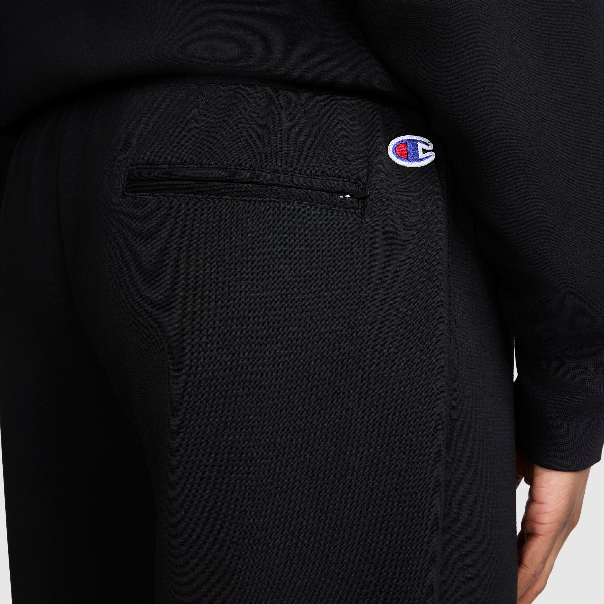 Champion Taper Leg Jogger jogging noir à zips modal
