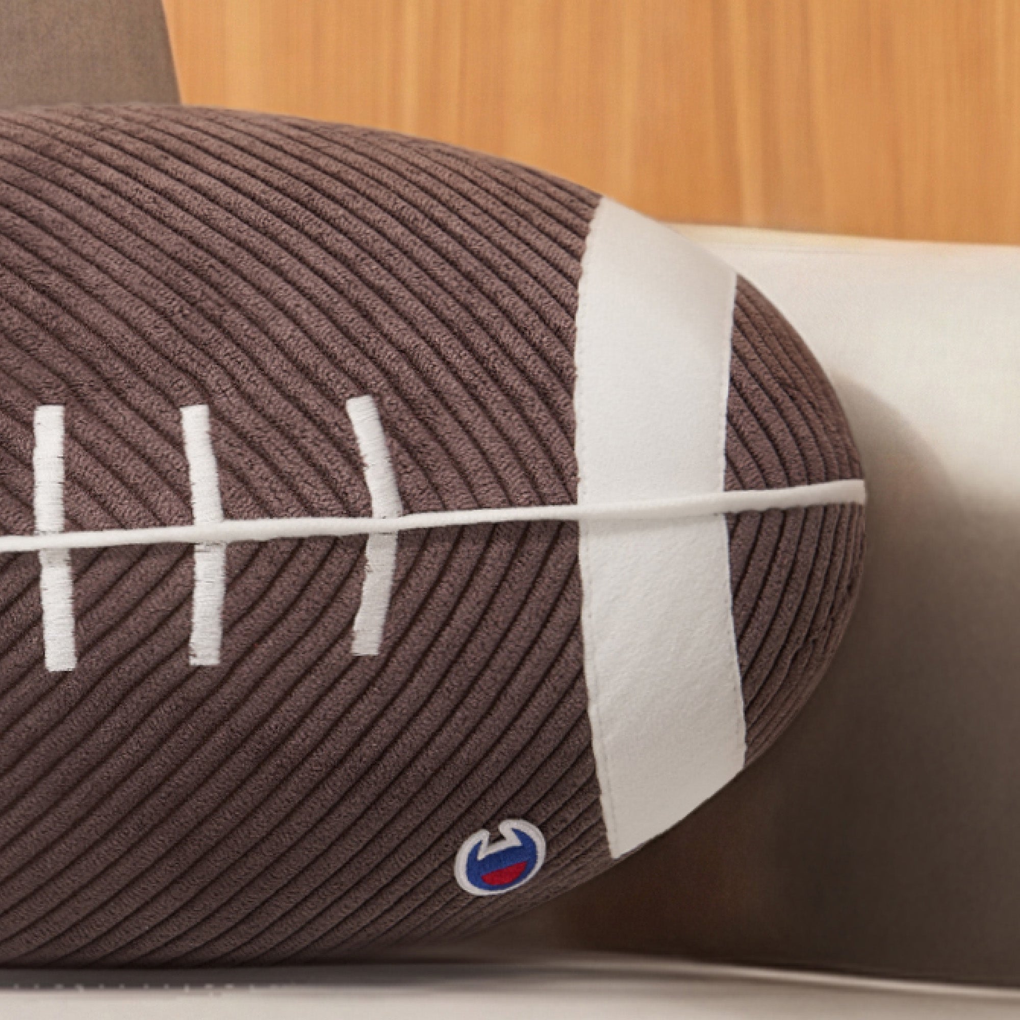 Champion Football coussin marron ballon américain velours